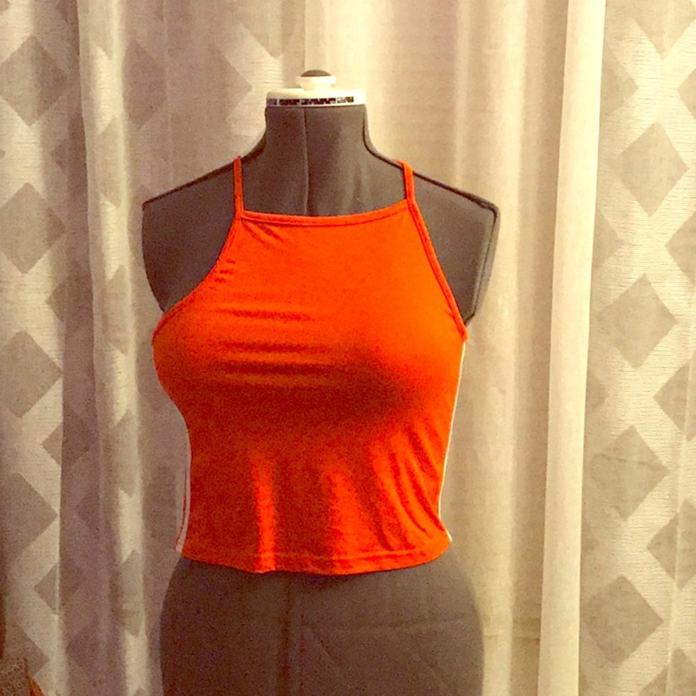 Orange crop top and fake fur vest